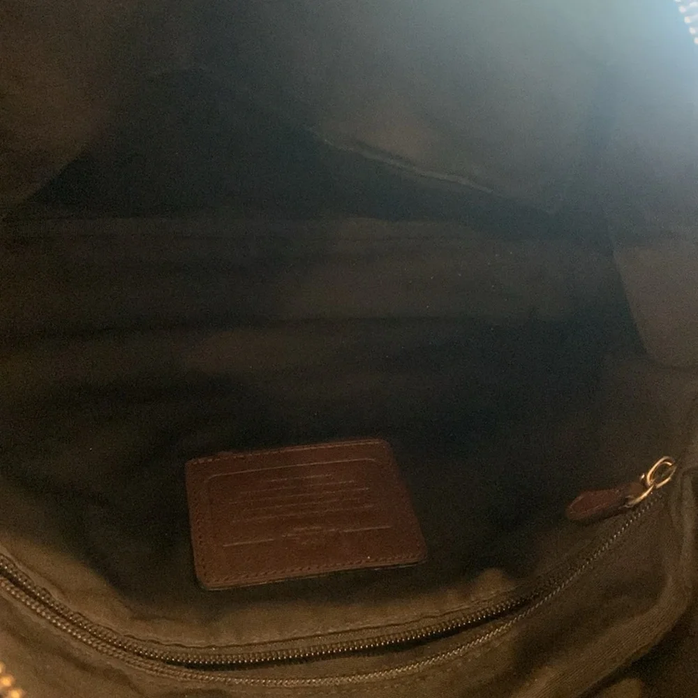 Mens brown leather Coach briefcase with adjustable shoulder straps!